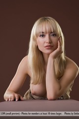 Big Titted Blonde Beauty Lia Poses