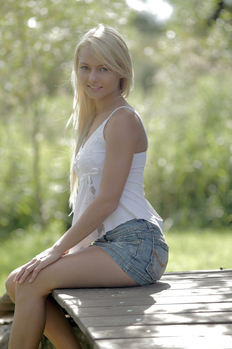 Sweet Blonde Anneli In Short Skirt